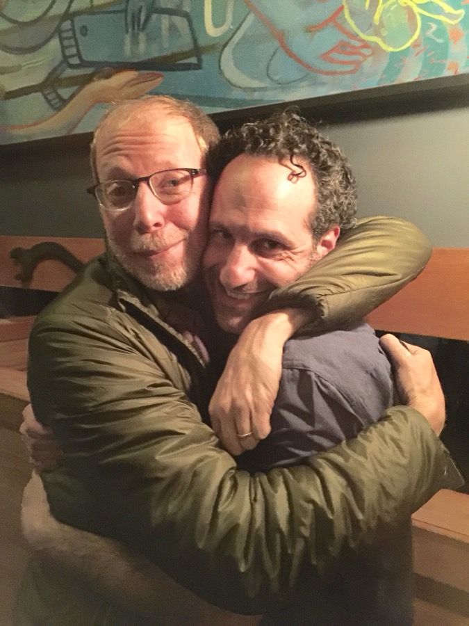 Steven hugging his friend Dave