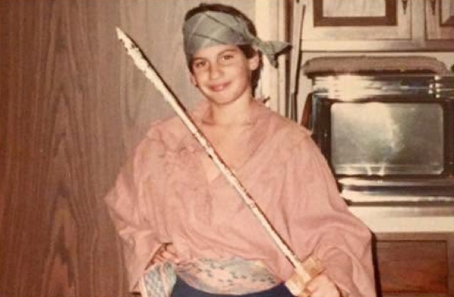 Steven as a kid in a pirate costume holding a toy sword